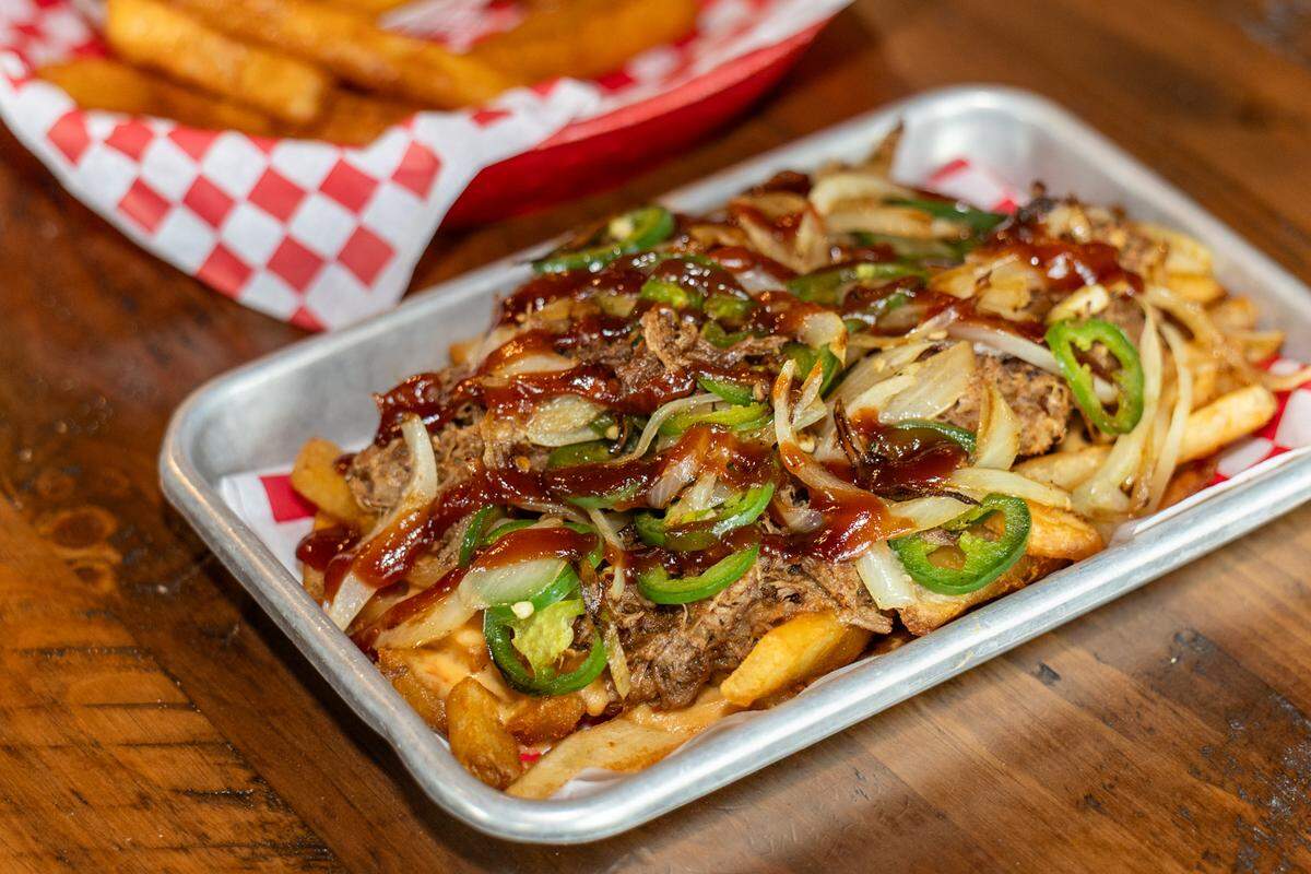 Angry Ale’s has been voted as the winner of the CharlotteFive Readers’ Choice Best Fries poll. The restaurant’s Dirty South fries are topped with house-smoked pulled pork, queso cheese, barbecue sauce, grilled onions and charred jalapenos.