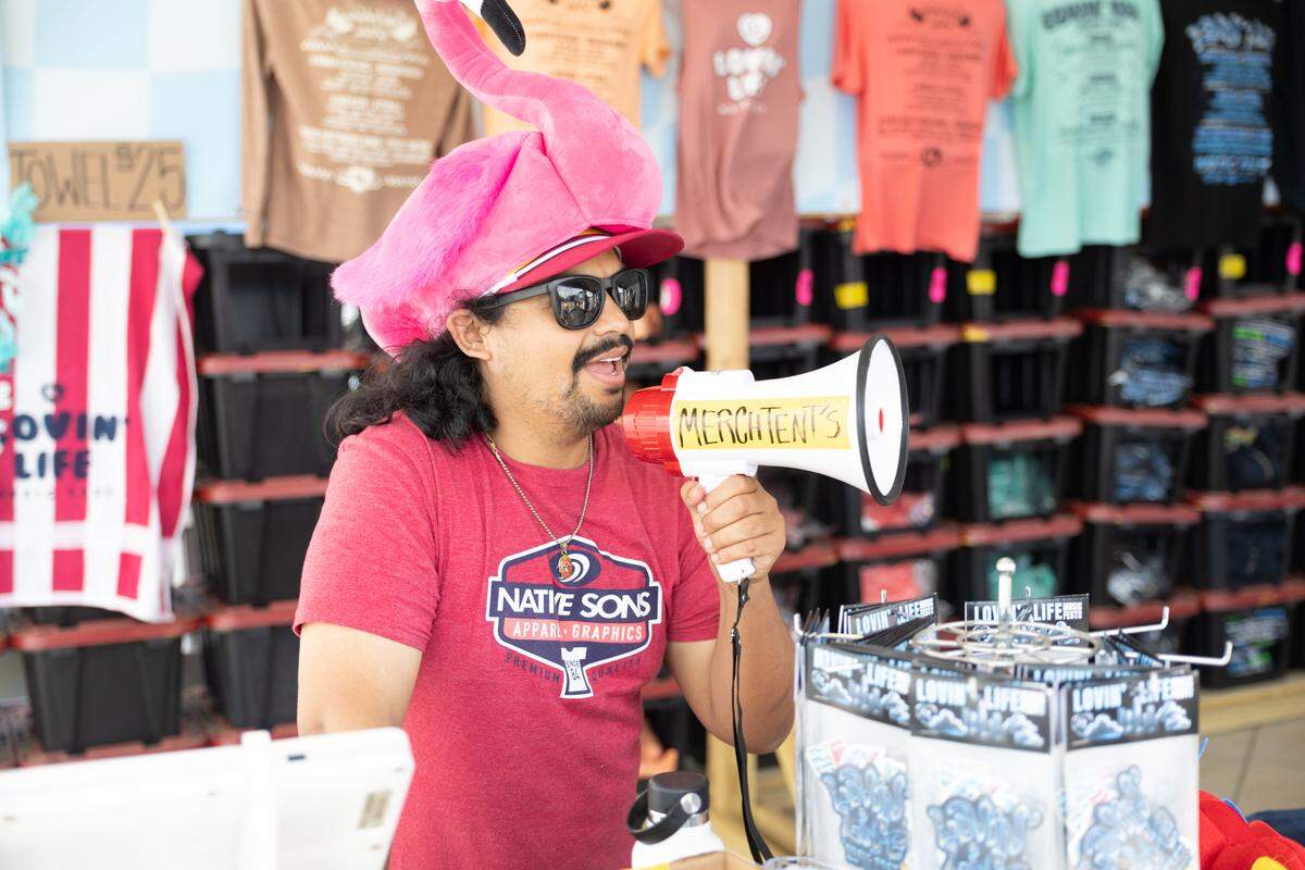 A merch worker at Lovin’ Life Music Fest.