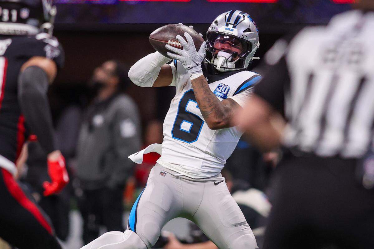 Jan 5, 2025; Atlanta, Georgia, USA; Carolina Panthers running back Miles Sanders (6) catches a pass for a touchdown against the Atlanta Falcons in the second quarter at Mercedes-Benz Stadium. Mandatory Credit: Brett Davis-Imagn Images