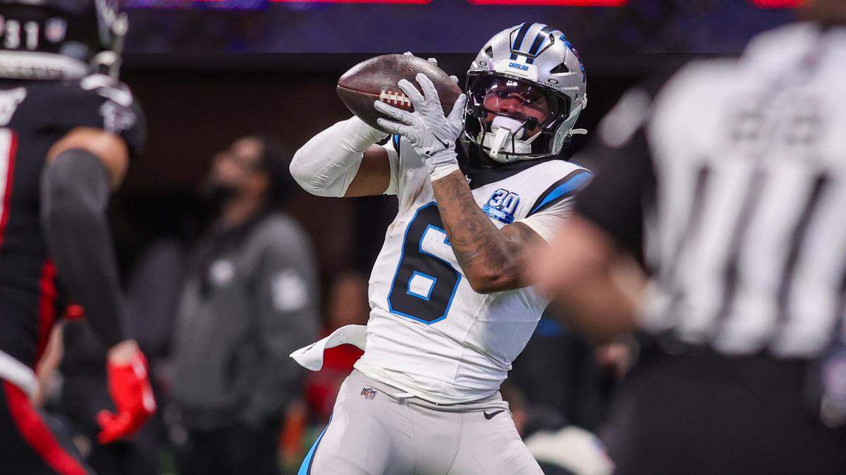 Jan 5, 2025; Atlanta, Georgia, USA; Carolina Panthers running back Miles Sanders (6) catches a pass for a touchdown against the Atlanta Falcons in the second quarter at Mercedes-Benz Stadium. Mandatory Credit: Brett Davis-Imagn Images