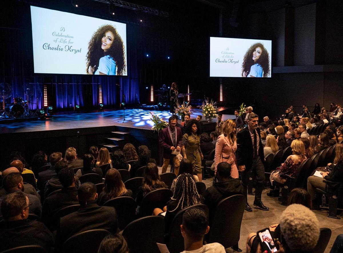 The family of Chelsie Kryst, center, are escorted after the memorial service to honor her life at Elevation Blakeney on Friday, February 18, 2022 in Charlotte, NC. Kryst, who was beloved in the Charlotte area and worked closely with local charities such as Dress for Success, was secretly suffering from depression and died by suicide on January 30, 2022 in New York City.