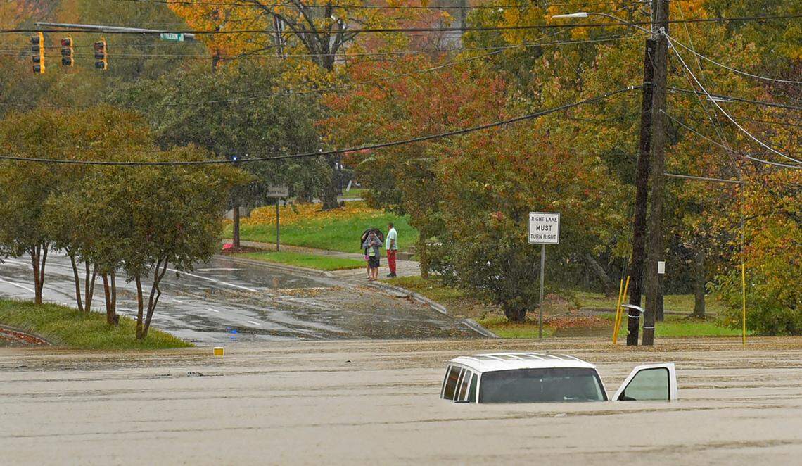 A vehicle is submerged in floodwater on Freedom Drive in Charlotte, NC on Thursday, November 12, 2020.