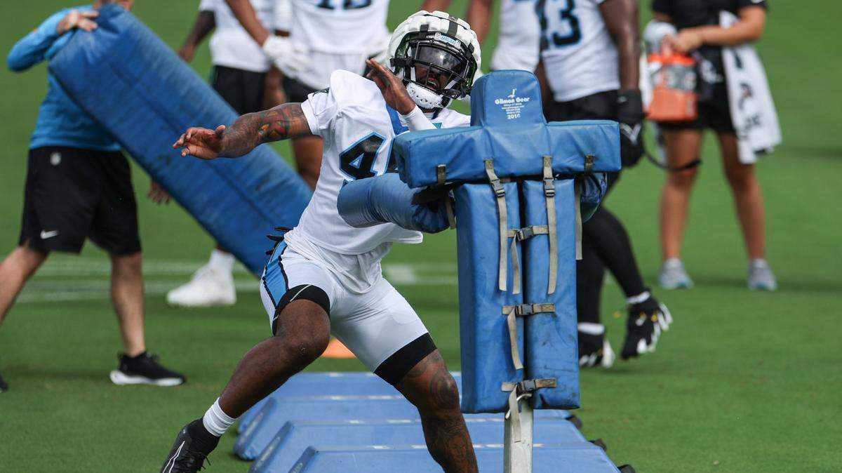 Panthers outside linebacker K’Lavon Chaisson runs through a drill during day one of training camp practice in Charlotte, NC on Wednesday, July 24, 2024.