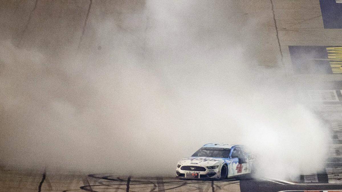 Kevin Harvick does a victory burnout after winning the Cook Out Southern 500 at Darlington Raceway on Sunday, September 6, 2020.