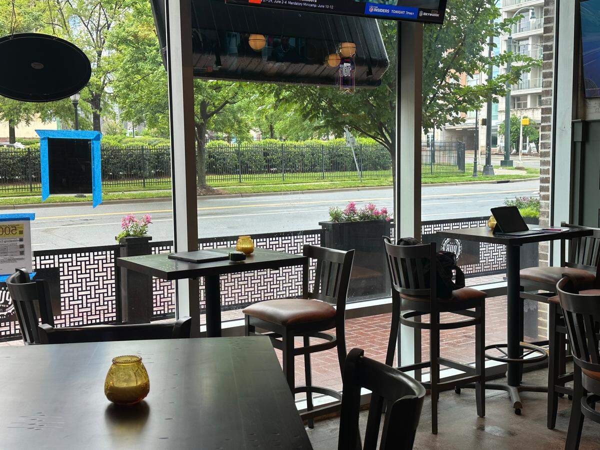 The Pub at Uptown offers enclosed patio seating.