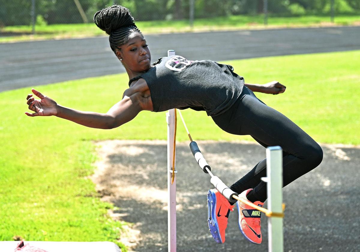 Butler High’s Cheyla Scott has set four national high jumping records and is jumping NCAA qualifying heights as a junior. Scott is being heavily recruited and has Olympics on her mind.