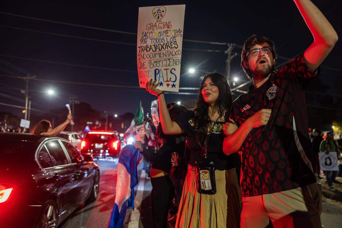 Protesters gather outside of Manolo’s Bakery to protest ICE and Border Patrol in Charlotte on Wednesday, November 20, 2025.