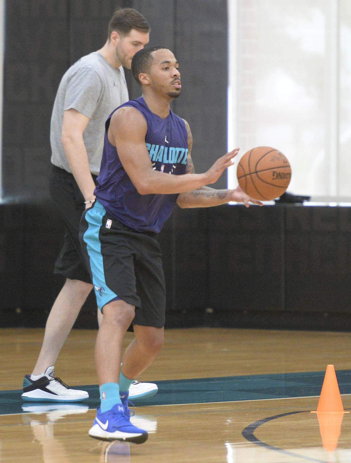 Jon Davis reaches for a pass during the Charlotte Hornets pre-draft workout at Novant Health Training Center at Spectrum Center - Practice Court on Friday, May 25, 2018.