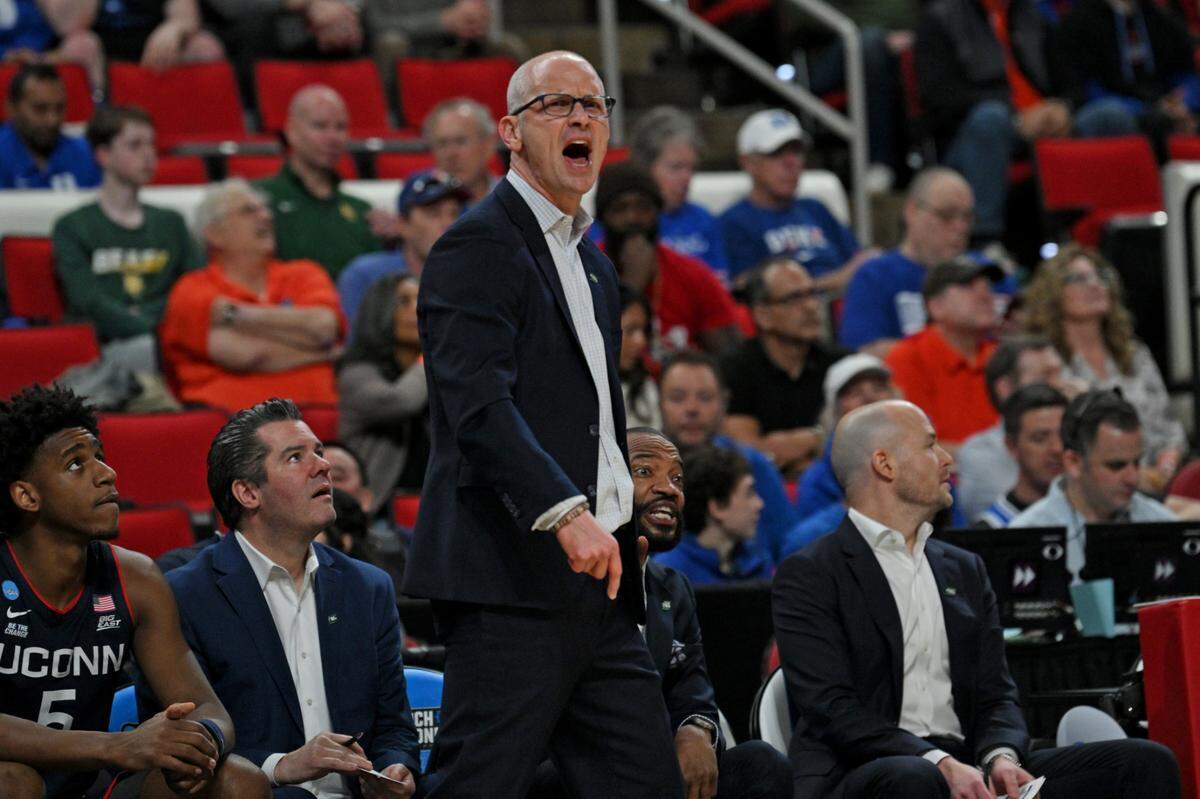 Mar 23, 2025; Raleigh, NC, USA; Connecticut Huskies head coach Dan Hurley reacts during the first half against the Florida Gators in the second round of the NCAA Tournament at Lenovo Center. Mandatory Credit: Zachary Taft-Imagn Images
