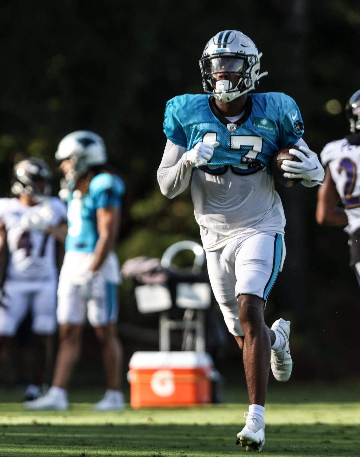 Carolina Panthers Omar Bayless runs with ball during a joint practice with the Baltimore Ravens in Spartanburg, S.C., on Wednesday, August 18, 2021.