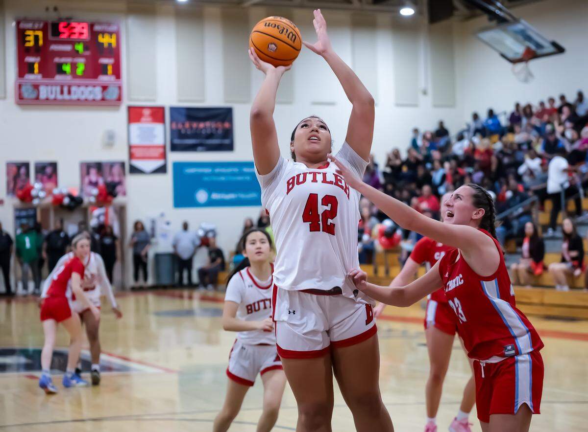 Butlers Chloe Ross goes up for two against Charlotte Catholics defense on February 7th, 2025 at Butler high school in Matthews, NC
