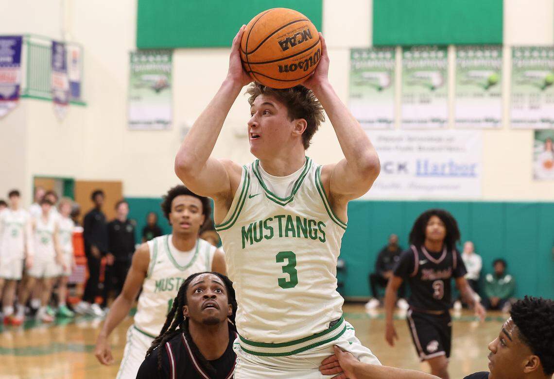 Myers Park Mustangs standout Thomas Vickery, center, drives to the basket for a shot during action against the West Meck Hawks on Feb. 6, 2026, at Myers Park High School in Charlotte. West Meck defeated Myers Park 62-59.