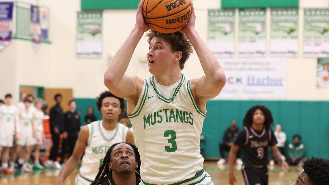 Myers Park Mustangs standout Thomas Vickery, center, drives to the basket for a shot during action against the West Meck Hawks on Feb. 6, 2026, at Myers Park High School in Charlotte. West Meck defeated Myers Park 62-59.