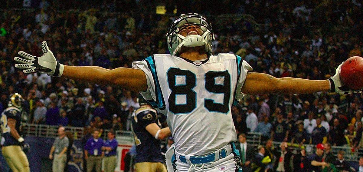 Carolina Panthers Steve Smith runs into the end zone untouched for a 69-yard touchdown to beat the St. Louis Rams in double overtime during the 2003 NFL playoffs.