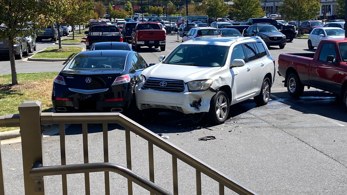A fight started near a Harris Teeter store near Berewick Town Center off Steele Creek Road after the driver of a blue Chevrolet Tahoe SUV crashed into two other vehicles then rolled backwards, witnesses told The Charlotte Observer. Two men began arguing and fighting.