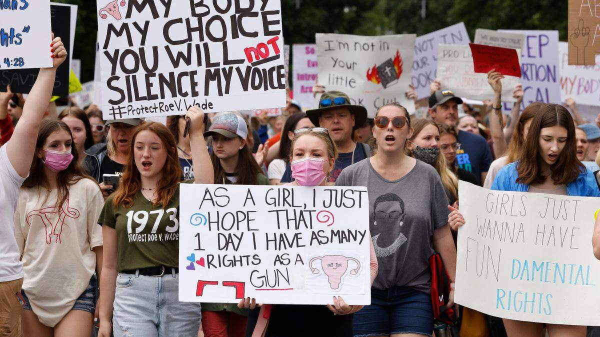 Abortion rights protesters march through downtown Raleigh, N.C. during the Bans Off Our Bodies abortion rights march and rally Saturday, May 14, 2022.