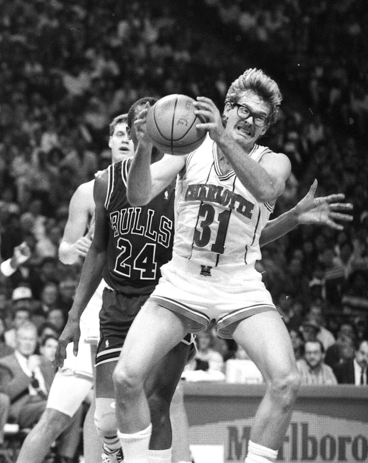 Kurt Rambis, #31, who hit the winning shot of the game, grabs a rebound. Michael Jordan, now the owner of the Charlotte Hornets, scored 33 points against them in December 23, 1988 game in Charlotte. The Hornets beat the Bulls 103-101 behind Kelly Tripucka’s 30 points.