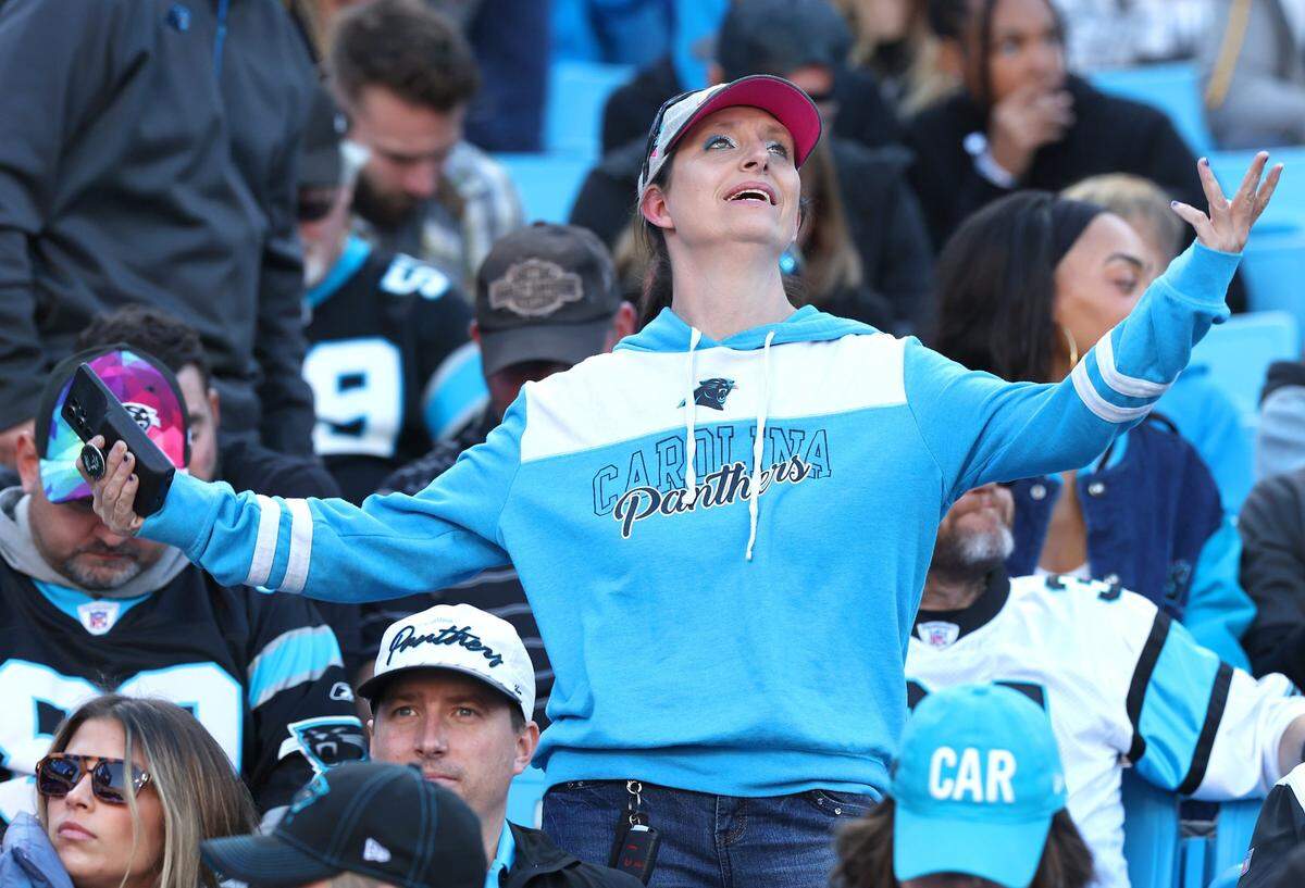A Carolina Panthers fan reacts to the team’s poor play during second half action against the Dallas Cowboys at Bank of America Stadium in Charlotte, NC on Sunday, November 19, 2023. The Cowboys defeated the Panthers 33-10.