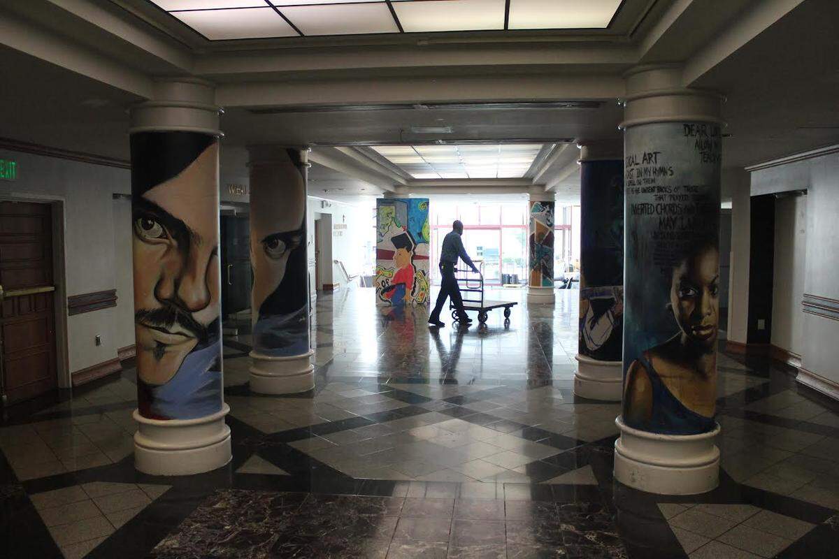 Marvin Hinson, building services supervisor, assists the team moving out of Spirit Square in the final days the building was open. Two theaters in the building, McGlohon and Duke Energy, had their last shows in September before closing in anticipation of a massive redevelopment project.