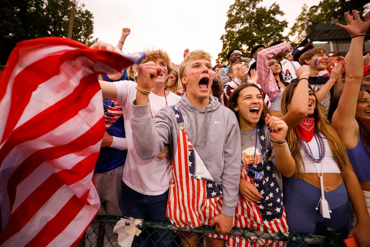Myers Park high school students cheer on the team during a game between Myers Park and Ardrey Kell at Myers Park High School in Charlotte, N.C., Thursday., Sept. 29, 2022.