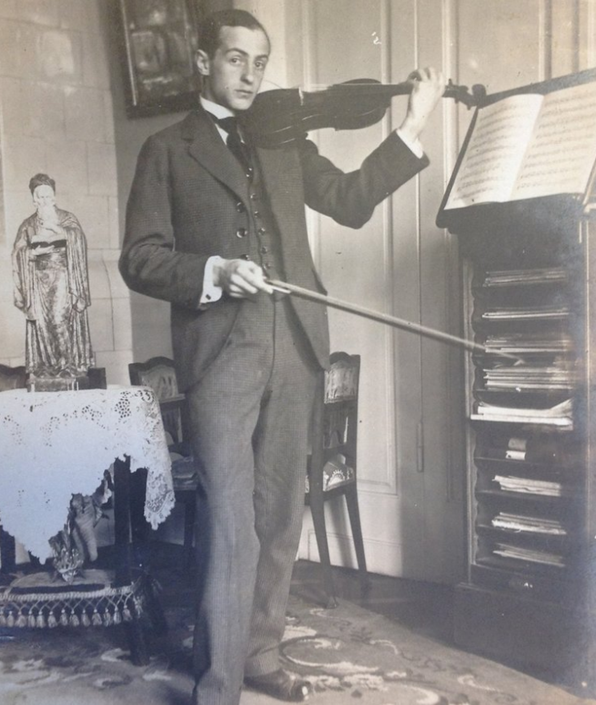 Undated photo of Shimon Krongold in his music room in Warsaw.