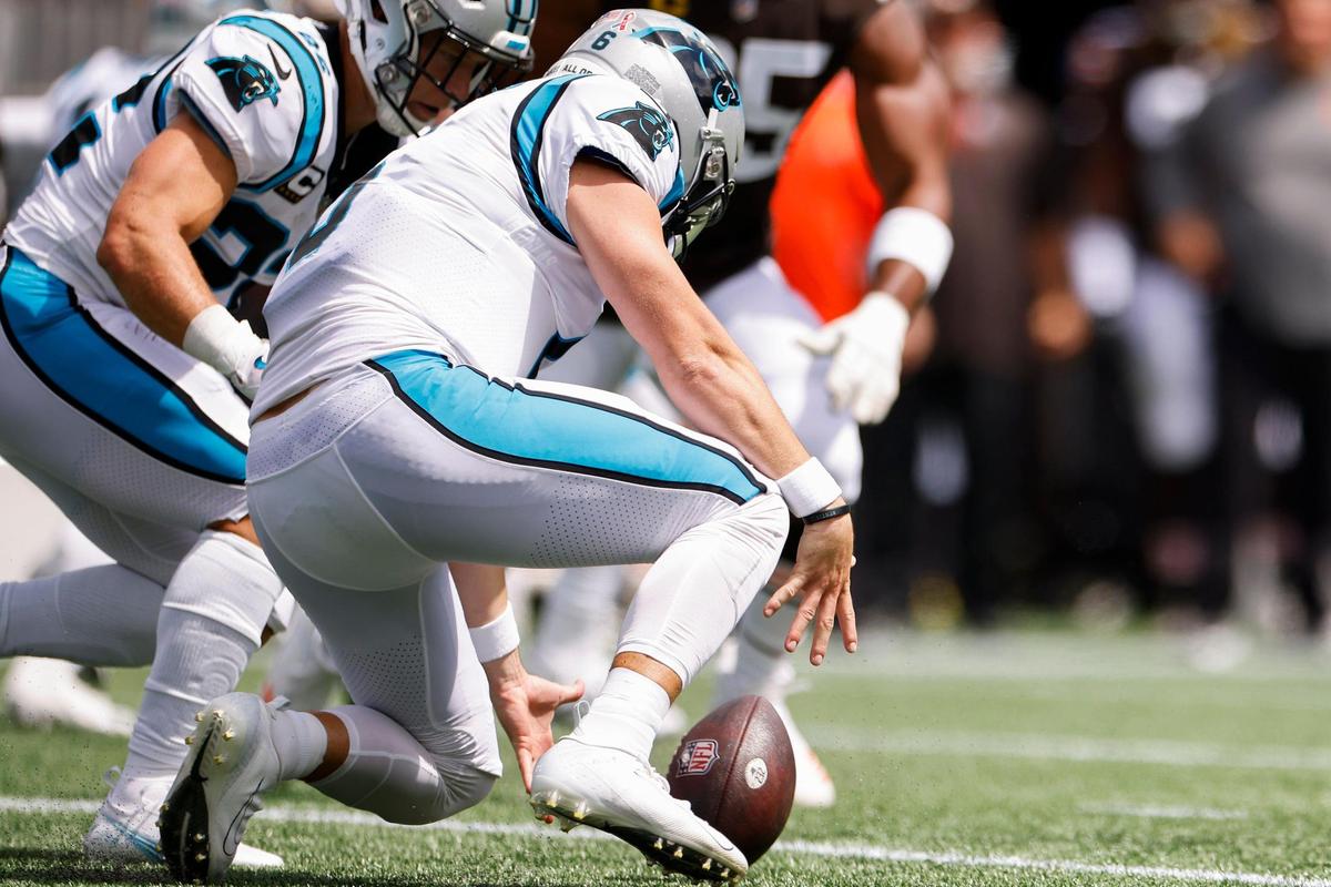 Carolina Panthers quarterback Baker Mayfield (6) fumbles a snap during a game against the Cleveland Browns at Bank of America Stadium in Charlotte, N.C., Sunday, Sept. 11, 2022.
