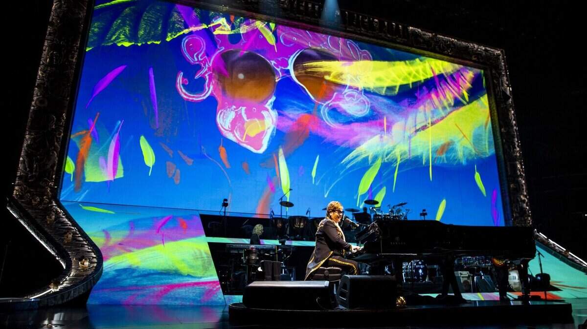 Elton John — photographed performing “Bennie and the Jets” during his “Farewell Yellow Brick Road” tour at Amway Center in Orlando in March 2019 — will do a show at Bank of America Stadium in 2022.