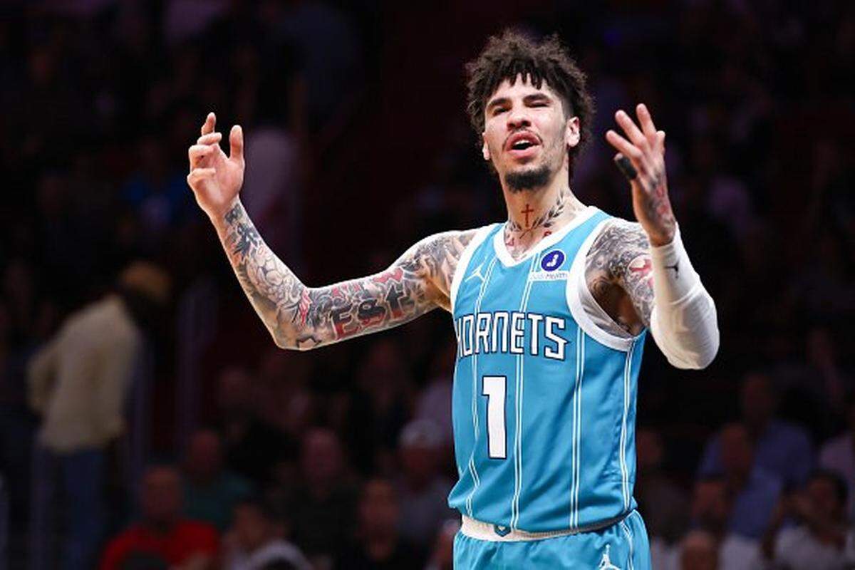 LaMelo Ball #1 of the Charlotte Hornets reacts during the second quarter of the game against the Miami Heat at Kaseya Center on October 28, 2025 in Miami, Florida. 