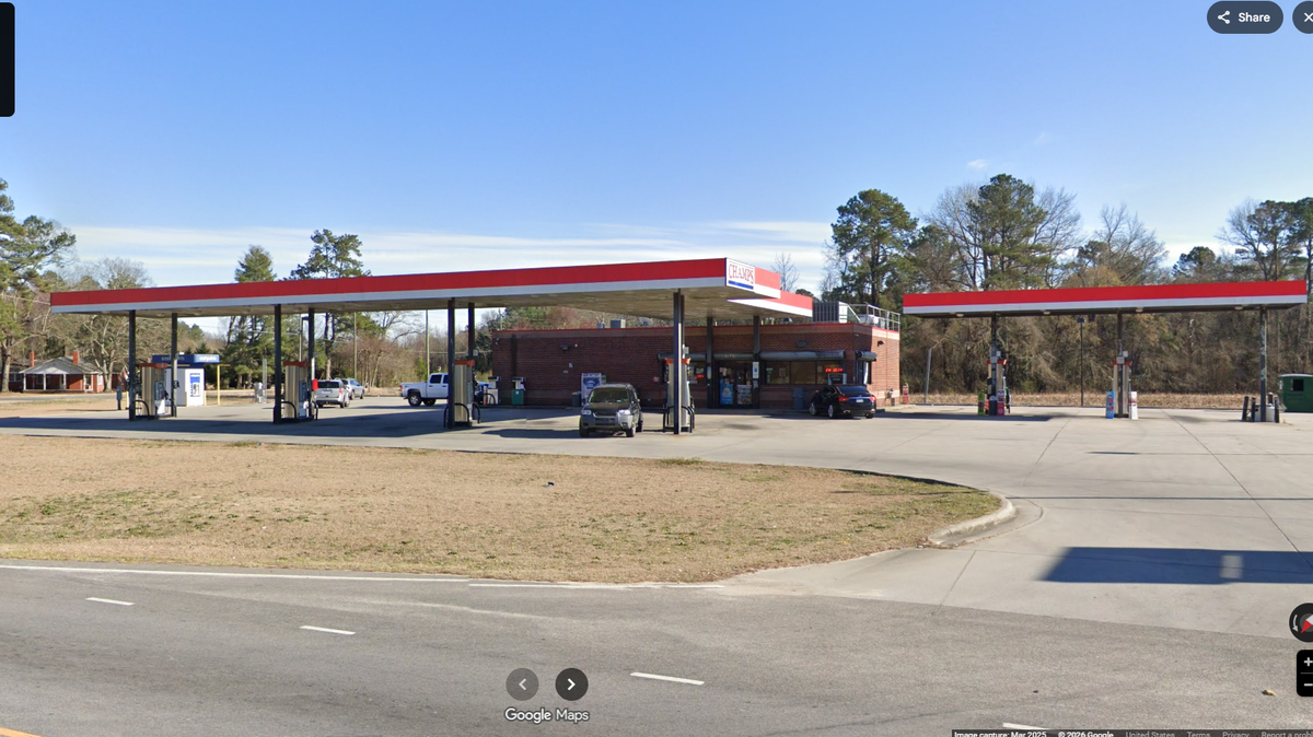 The suspect was captured after someone pulled him from a vehicle parked outside this gas station on NC 41 near Bladenboro, North Carolina, officials said.