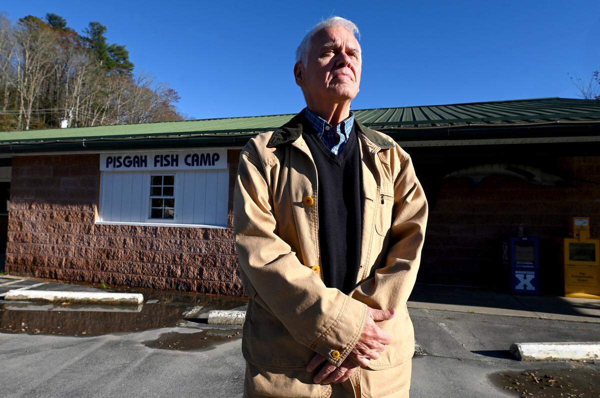 Mike Hawkins stands outside the Pisgah Fish Camp Restaurant in Brevard, NC on Friday, November 15, 2024. The restaurant has been in his family for almost 60 years. Rain from Hurricane Helene filled a creek near the restaurant causing water to rise three-feet. With three-feet of water inside the restaurant the walls, wiring and cooking equipment were damaged. The restaurant remains closed.