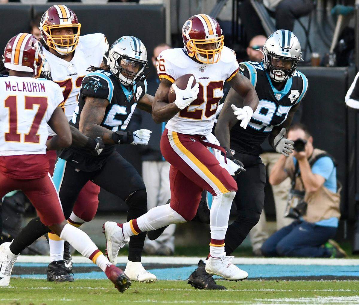 Washington running back Adrian Peterson (26) gains some of his 99 rushing yards Sunday. Peterson’s teammate Derrius Guice had 129 yards rushing, and the two combined for three rushing TDs in Washington’s 29-21 win.