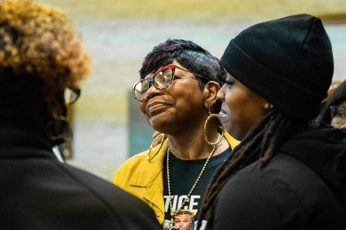 Salamondra Robinson, mother of Shanquella Robinson, hugs guests after a rally calling for justice for Shanquella, who died under suspicious circumstances while on vacation in Mexico with friends in October.