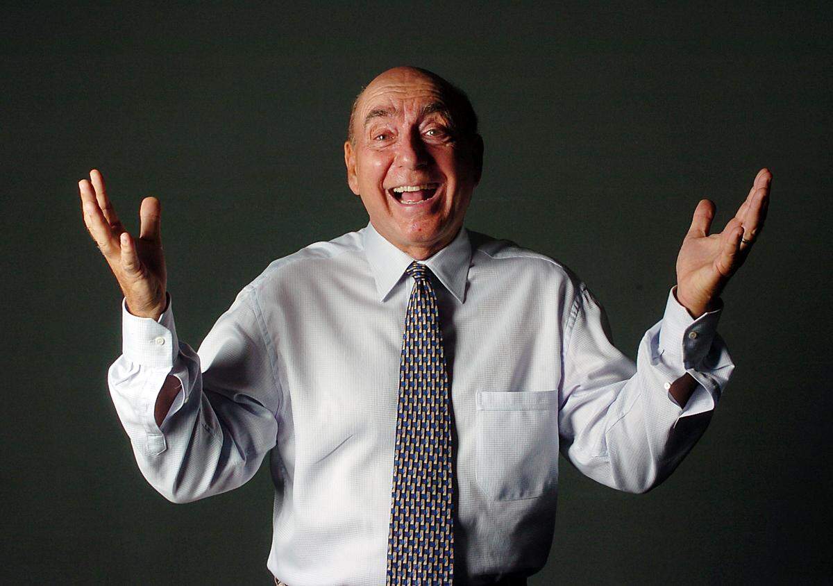 Dick Vitale poses for a photo in Charlotte in 2005.
