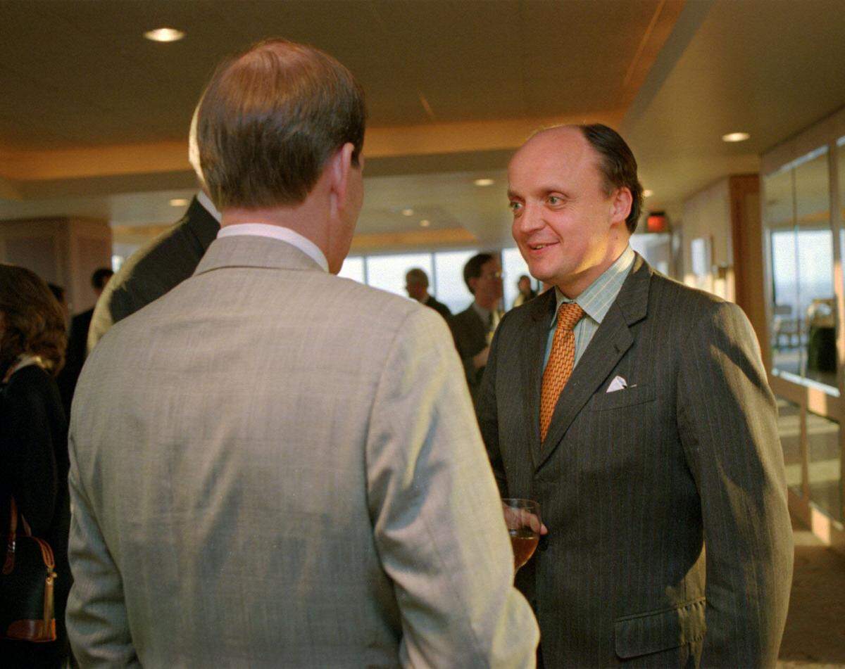 In this 1996 file photo, Charlotte developer Count Arco (at right) announces the planned construction of an office tower near SouthPark mall. Count Arco died in his native Austria on Aug. 24, 2014, European media outlets reported.