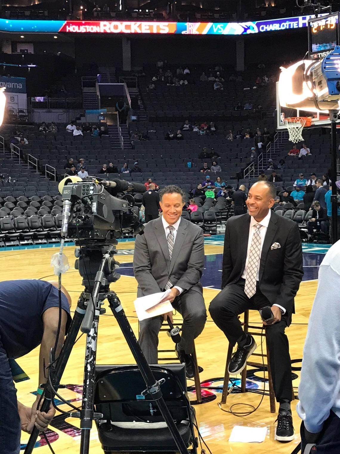 Eric Collins (left) and Dell Curry broadcast a Charlotte Hornets game. The two began working together in 2015.