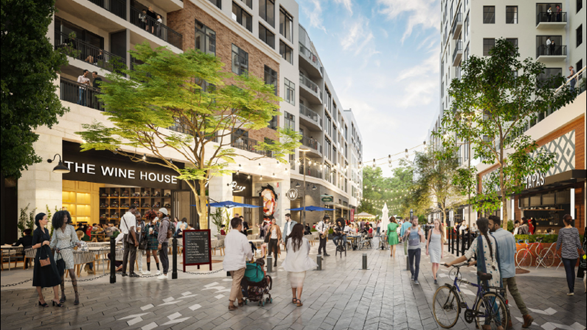 A rendering shows a pedestrian-friendly street that’s part of a 9-acre rezoning in SouthPark. Developer Related Group is seeking to build 730 apartments, up to 24 town homes along with retail space. Charlotte City Council voted on the project Monday night.