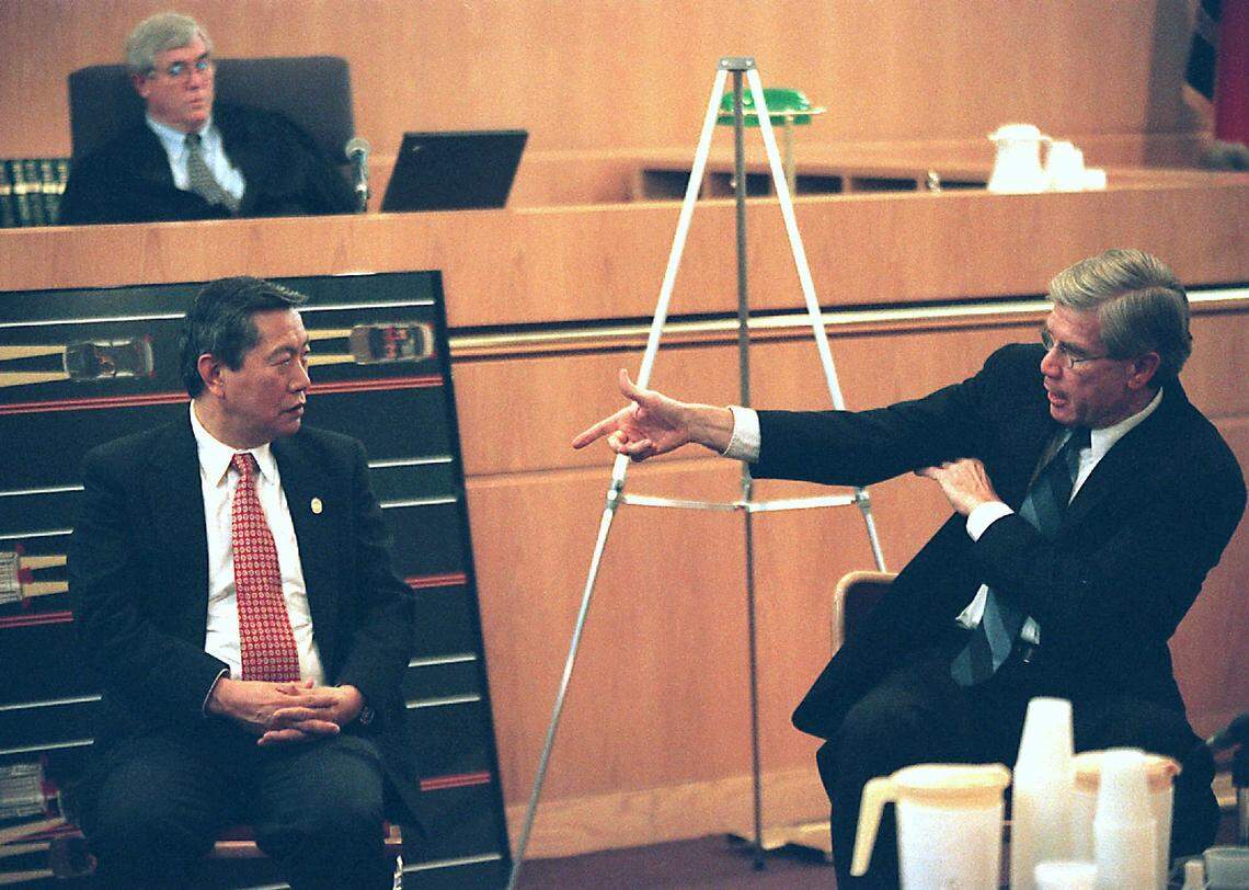 Prosecutor Gentry Caudill cross-examines forensic scientist Henry Lee during the trial. Lee, a defense witness, also testified in the O.J. Simpson case.