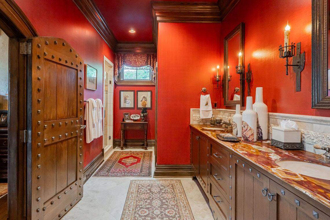 The mansion has five bedrooms and eight bathrooms.