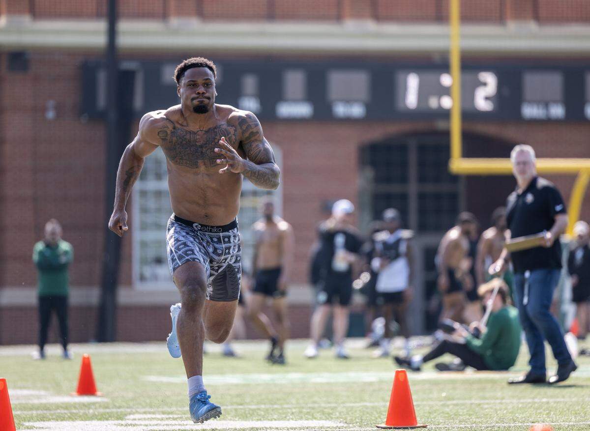 Charlotte 49ers defensive back Ja’Qurious Conley runs during pro day at Jerry Richardson Stadium in Charlotte, North Carolina, on Thursday, March 26, 2026.