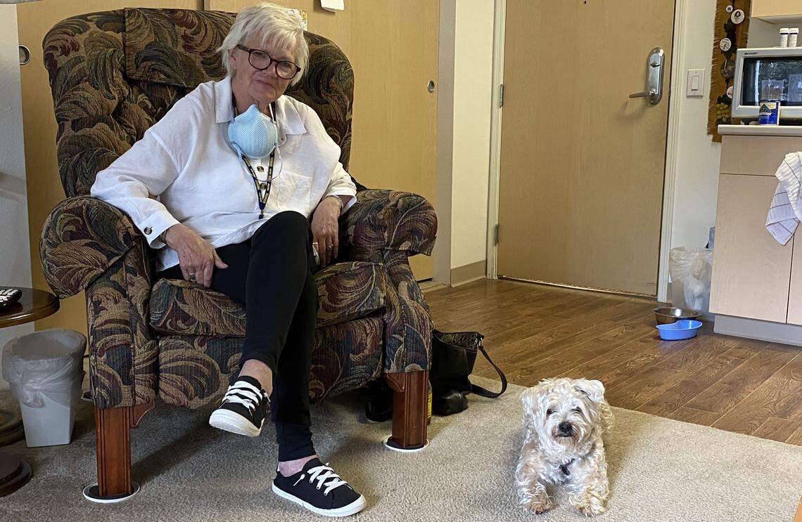 Joette Tavernise with her dog Boogie at their new temporary living situation in Hickory.
