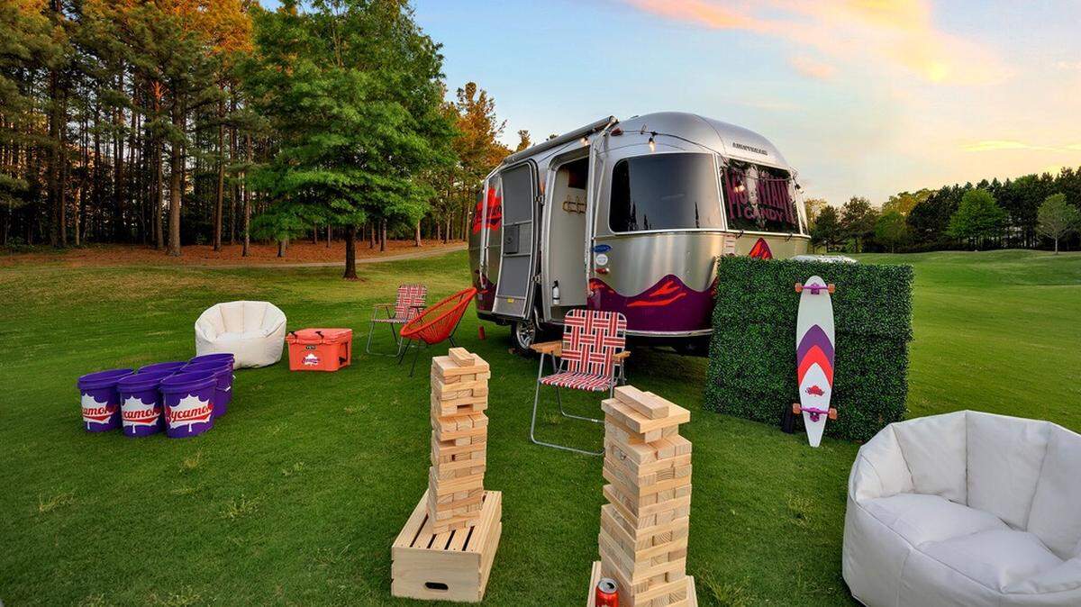 Sycamore Brewing is giving away a camper to celebrate its Mountain Candy IPA — and a stocked beer fridge, hammock, surfboard, string lights and party games. As the team travels with its camper, it will set up lawn parties at its destinations, like the one shown above.