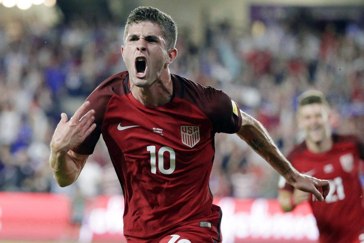 FILE - In this Oct. 6, 2017, file photo, United States’ Christian Pulisic (10) celebrates his goal against Panama during the first half of a World Cup qualifying soccer match in Orlando, Fla. Nineteen-year-old Christian Pulisic has become the youngest winner of the U.S. Soccer Federation’s Male Player of the Year award, USSF said Thursday, Dec. 14, 2017. (AP Photo/John Raoux, File)