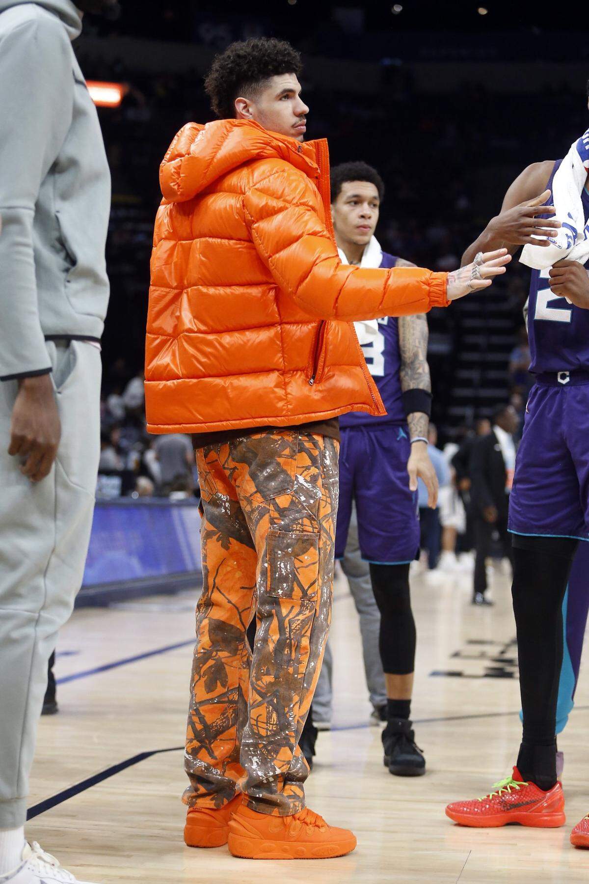 Charlotte Hornets guard LaMelo Ball stands and watches during a time out during the second half against the Memphis Grizzlies at FedExForum.