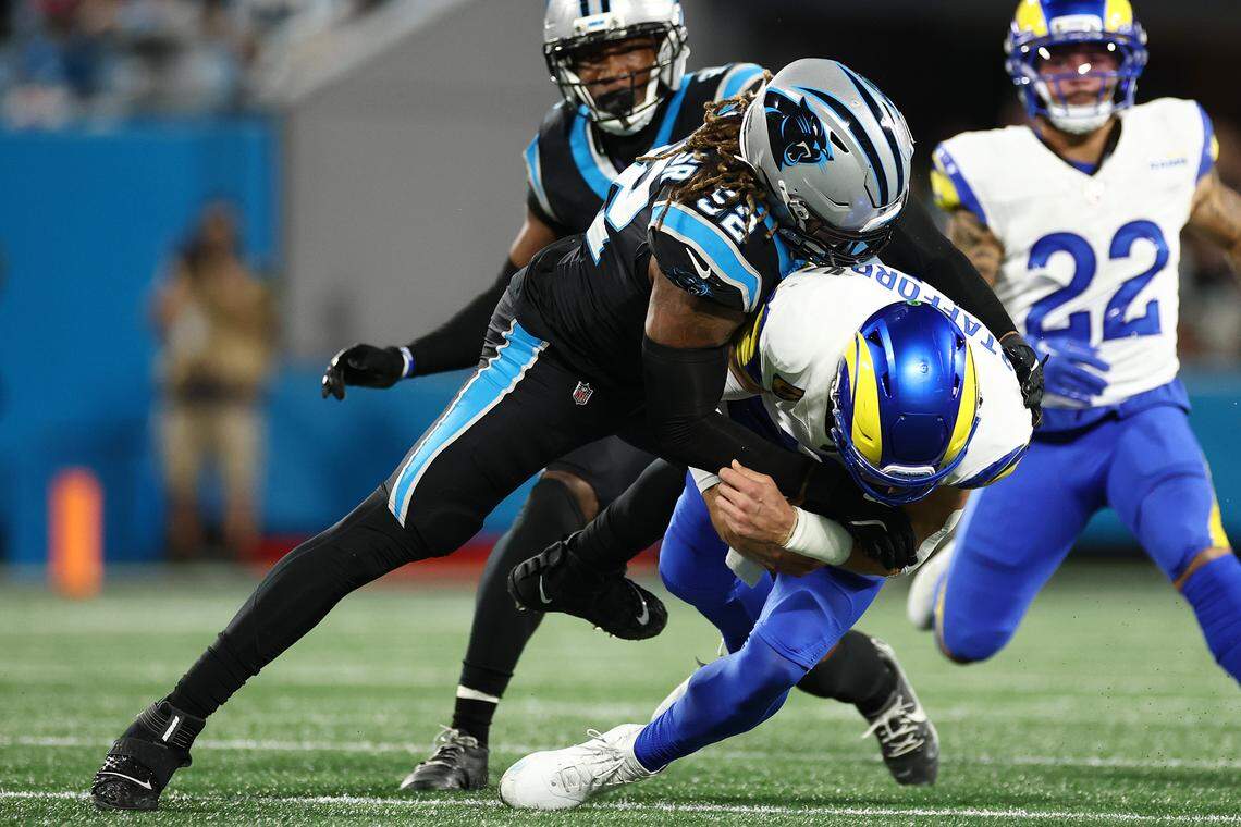 Carolina Panthers outside linebacker Trevis Gipson sacks Los Angeles Rams quarterback Matthew Stafford during the third quarter in the NFC Wild Card Playoff game at Bank of America Stadium on January 10, 2026 in Charlotte, North Carolina. (Photo by Jared C. Tilton/Getty Images)