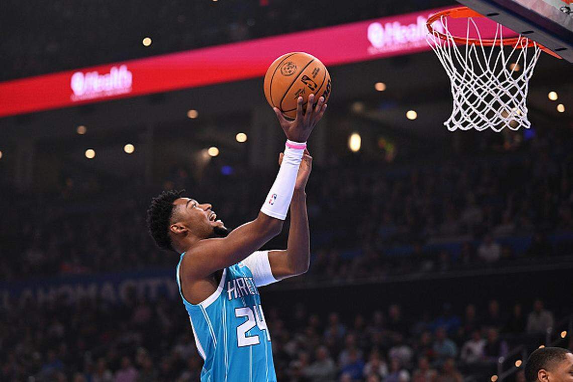 Brandon Miller of the Charlotte Hornets puts up a shot at the rim during the first half against the Oklahoma City Thunder at Paycom Center.