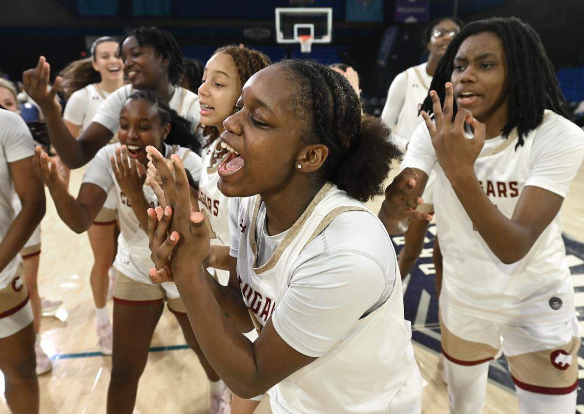 Members of the Cannon School Lady Cougars celebrate their 47-37 victory over Providence Day in the NCISAA girls state championship game on Saturday, February 28, 2026 at Novant Fieldhouse in Greensboro, NC. 
