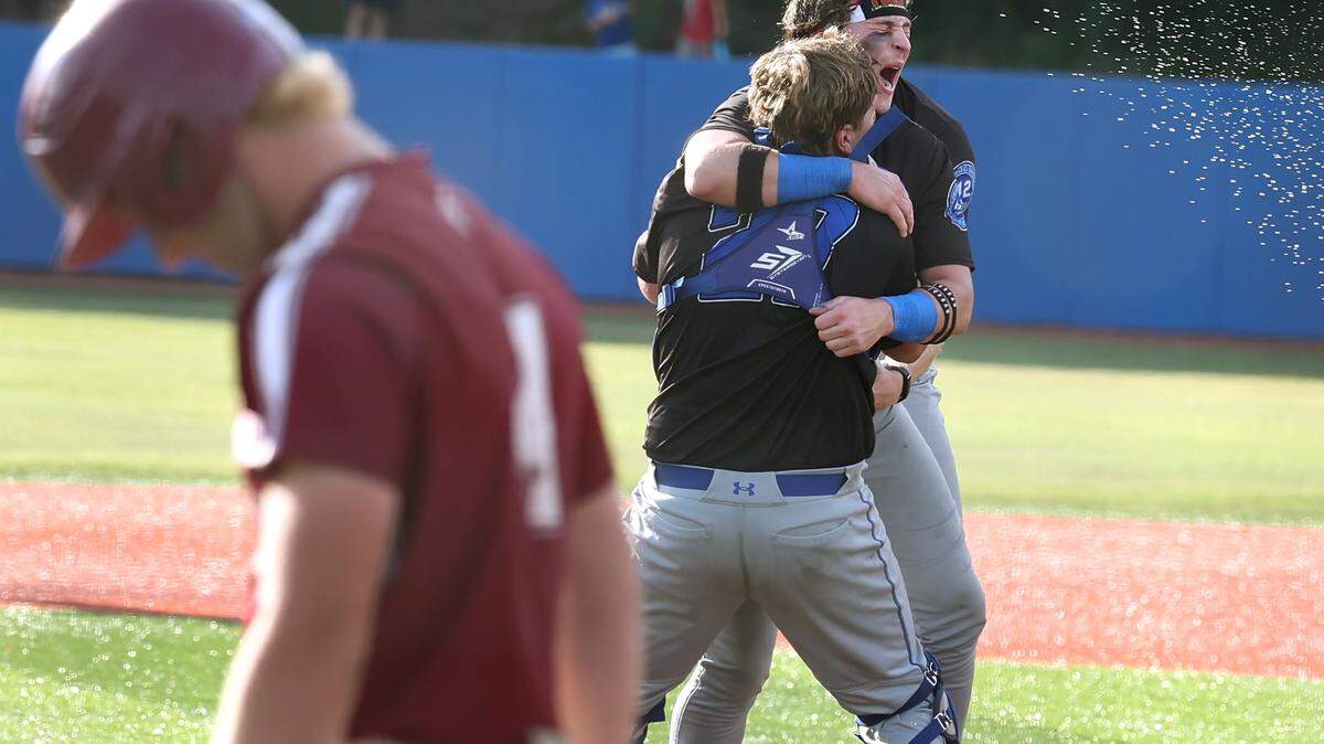 Charlotte Christian players celebrate their NCISAA state championship game victory over Metrolina Christian 8-5 on Saturday, May 16, 2026.