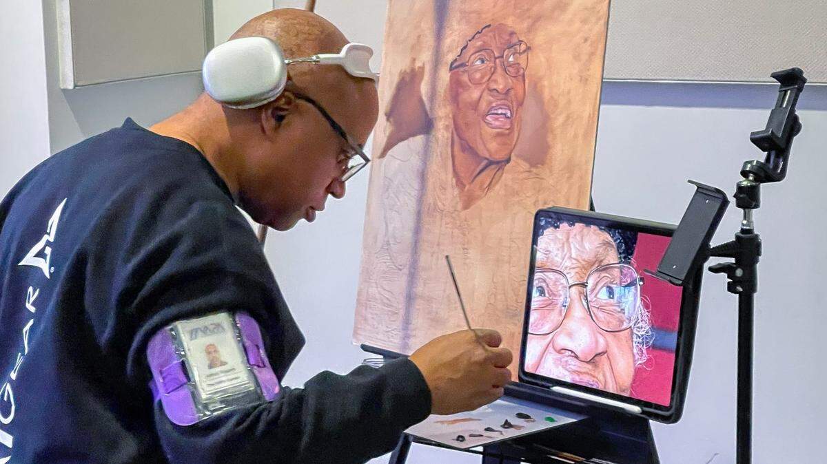 Art Rodgers created a portrait of Thereasea Clark Elder at the 2023 African American Heritage Festival, held at the Charlotte Museum of History.