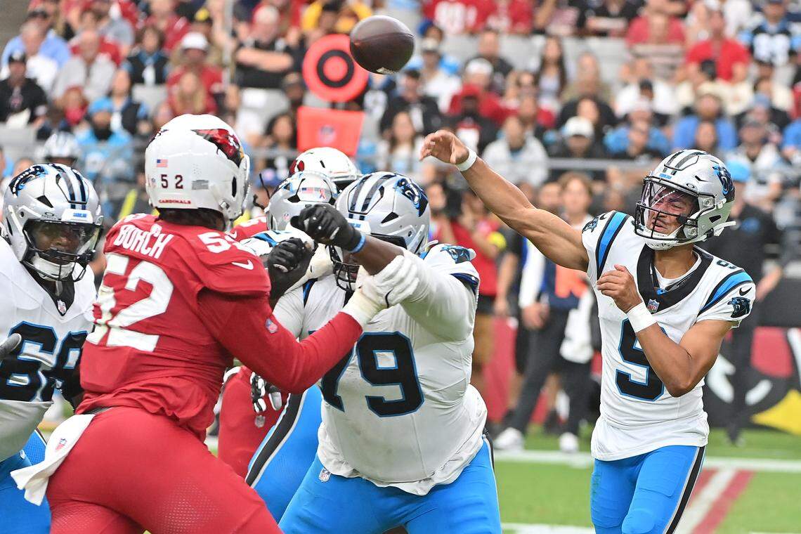 Carolina Panthers quarterback Bryce Young (9) throws a pass during the first quarter against the Arizona Cardinals at State Farm Stadium in Glendale, AZ on Sunday, Sept. 14, 2025. Young ended the day with 328 yards and three passing TDs.