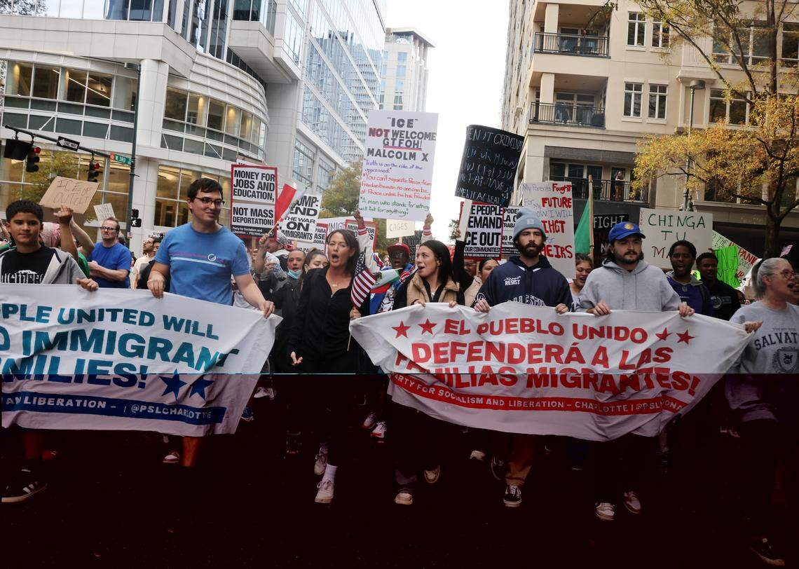 Hundreds march from First Ward Park in uptown Charlotte in the No Border Patrol protest on Saturday.